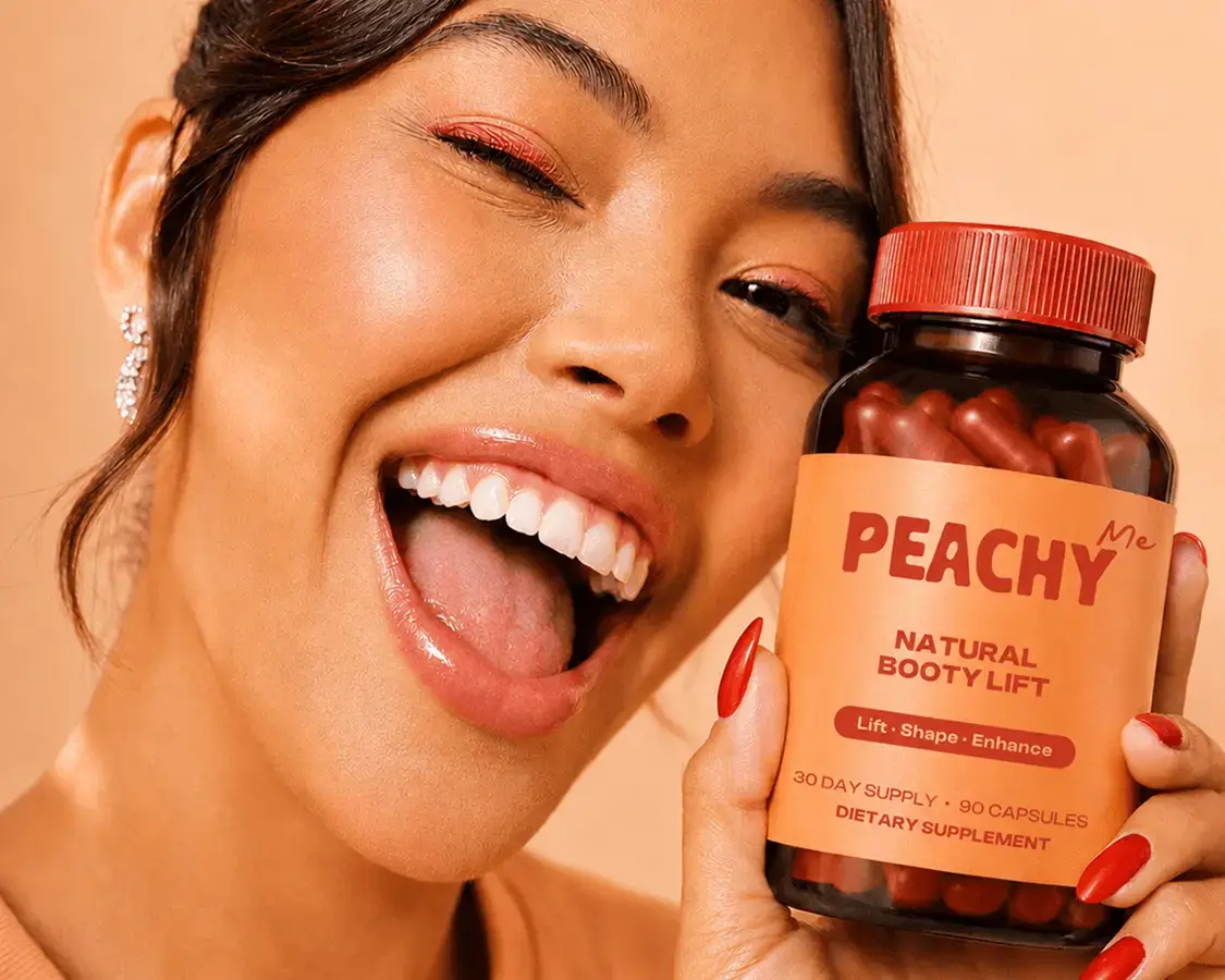 A happy woman holding a jar of Peachy product in her hands